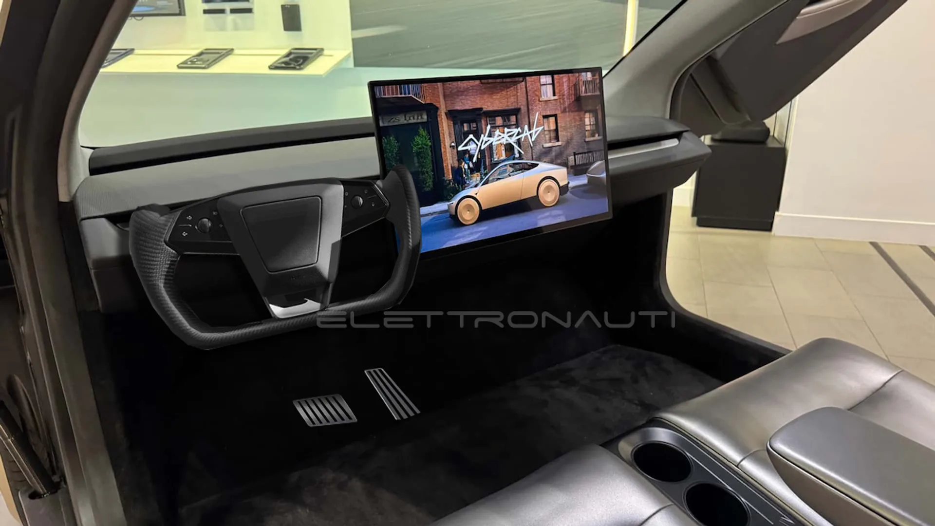 Tesla valuta un Cybercab con volante e pedali