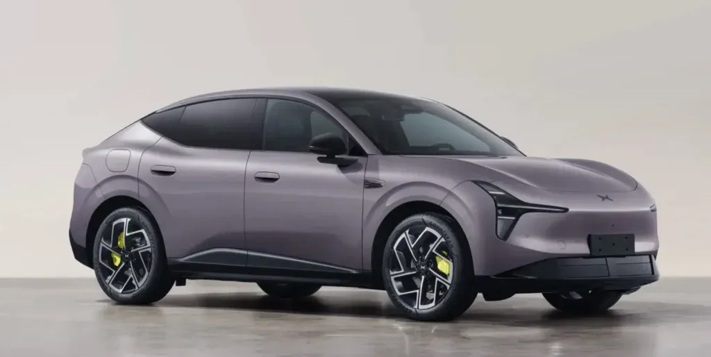 Three-quarter front view of a lavender-gray electric crossover with slim headlights and bright yellow brake calipers seen through stylish alloy wheels